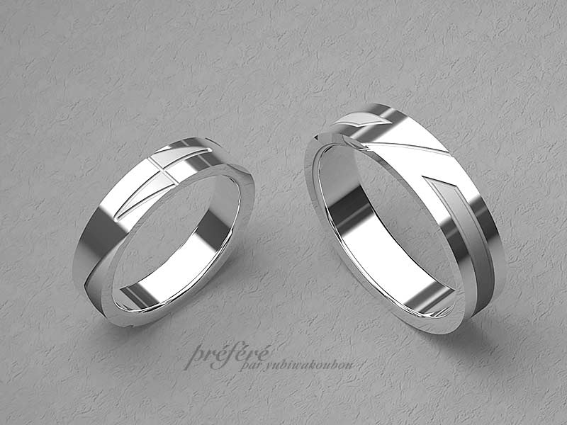 お二人のイニシャルをアレンジし、シンプルなデザインの結婚指輪