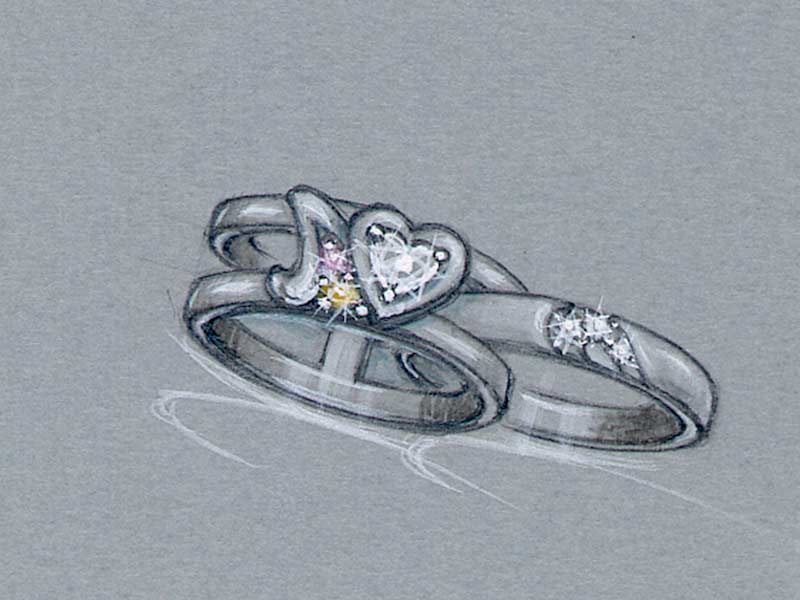 ペアリングとセットでつけるハートダイヤの婚約指輪　イメージ