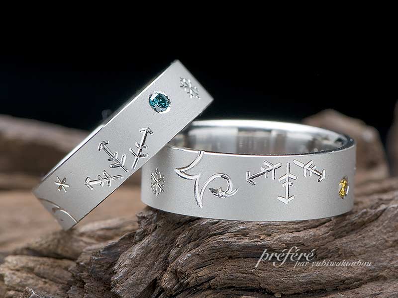 雪の結晶と釣り針をデザインしたペアの結婚指輪はオーダーメイド