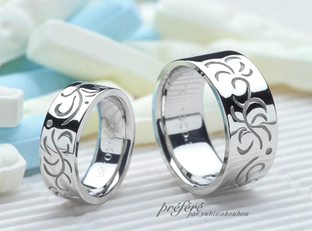 幅広の結婚指輪はプラチナベースでエレガントなデザイン