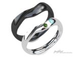 シンプルなデザインのリングに誕生石色のダイヤを入れた結婚指輪